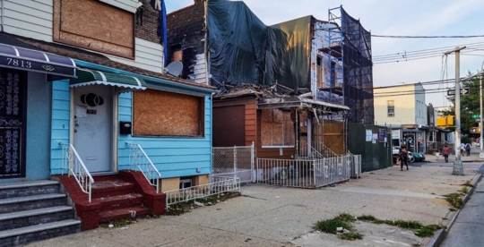 buildings damaged and boarded up