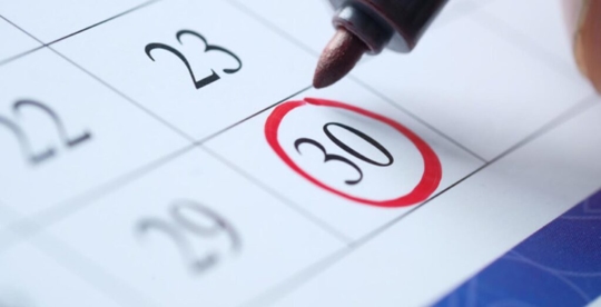 calendar with the day 30 circled in red